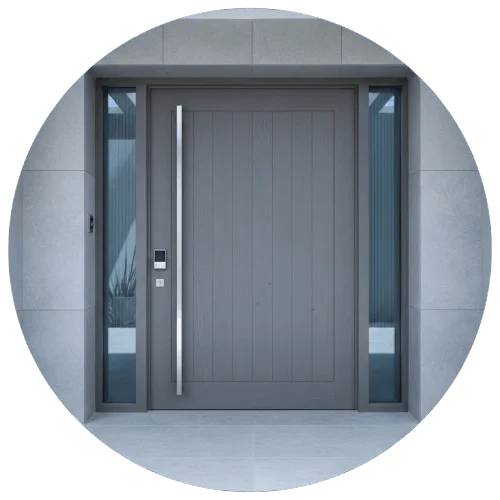 odern grey front door with a long silver handle.